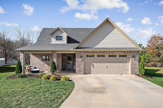 view of front of house with a garage, brick siding, driveway, roof with shingles, and a front lawn