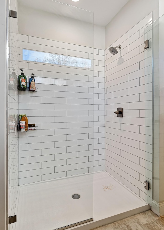 bathroom featuring a shower stall