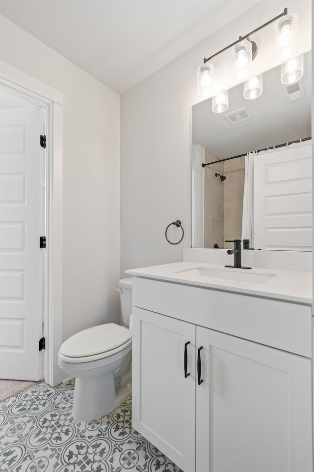 full bathroom featuring visible vents, toilet, a shower with curtain, tile patterned floors, and vanity