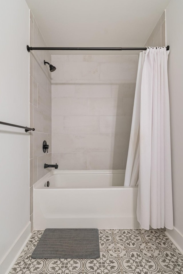 full bath featuring tile patterned flooring and shower / bath combination with curtain