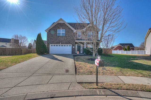 traditional-style home featuring brick siding, a front yard, fence, a garage, and driveway