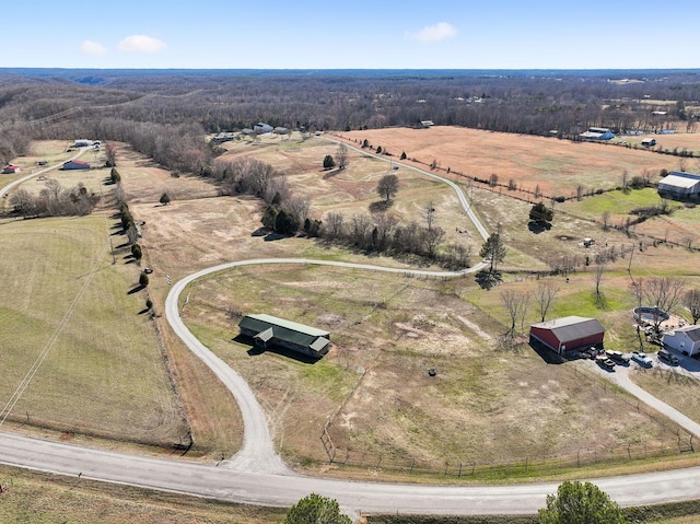 birds eye view of property featuring a rural view