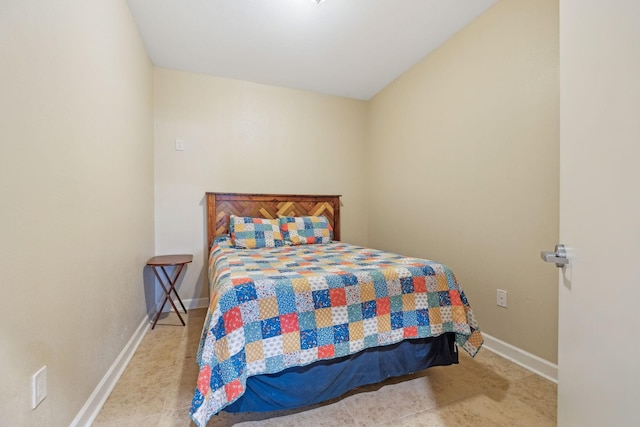 bedroom with baseboards