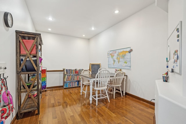 game room with baseboards, wood-type flooring, and recessed lighting