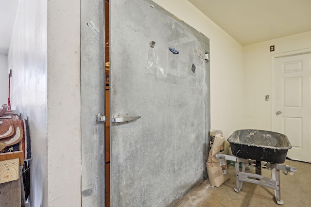 bathroom with unfinished concrete floors