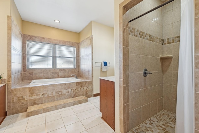 full bath with tile patterned flooring, a garden tub, vanity, and a shower stall