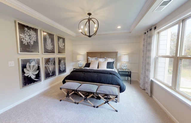 carpeted bedroom featuring crown molding, visible vents, a notable chandelier, and baseboards