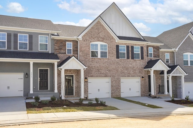 multi unit property with concrete driveway, brick siding, and board and batten siding