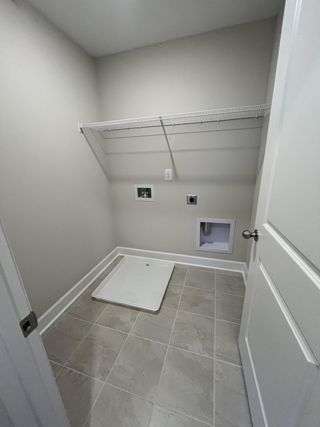 laundry room featuring baseboards, laundry area, washer hookup, and hookup for an electric dryer