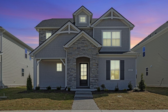 craftsman house with a front yard