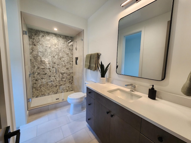 full bath featuring toilet, a stall shower, tile patterned flooring, and vanity