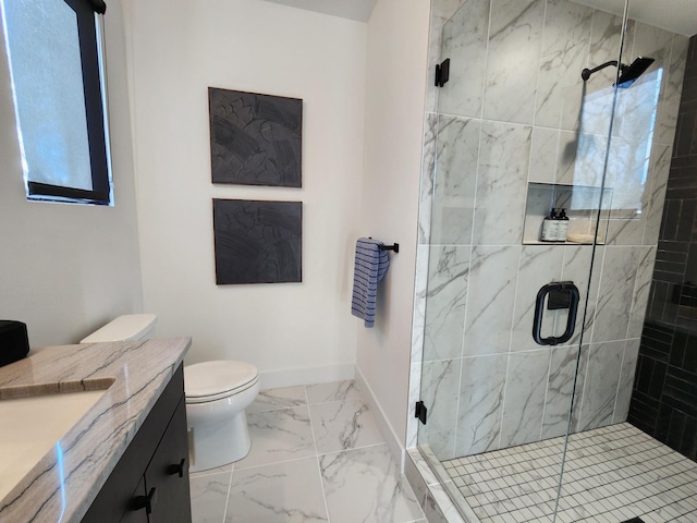 full bath with baseboards, toilet, marble finish floor, vanity, and a shower stall