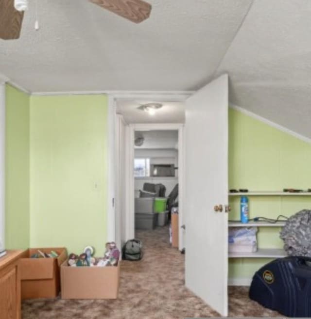 interior space featuring ceiling fan