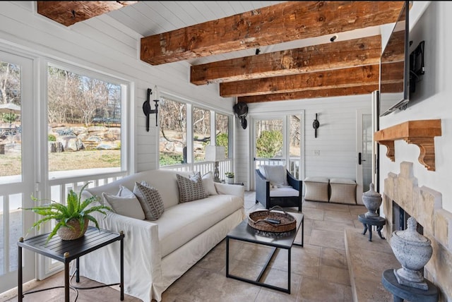 sunroom / solarium with beamed ceiling