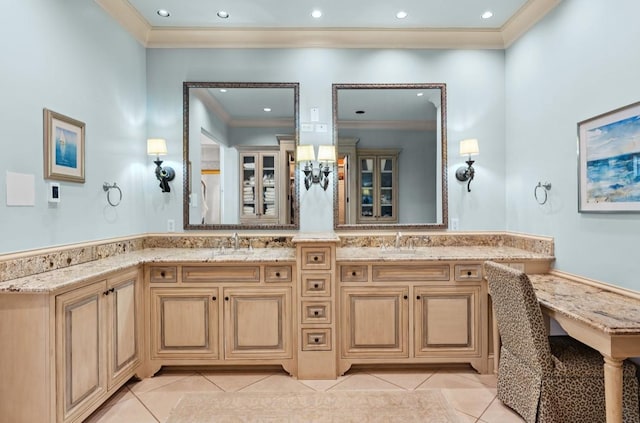 full bathroom with double vanity, tile patterned flooring, crown molding, and a sink