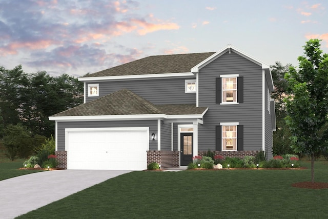 view of front of home featuring a shingled roof, concrete driveway, an attached garage, a front yard, and brick siding