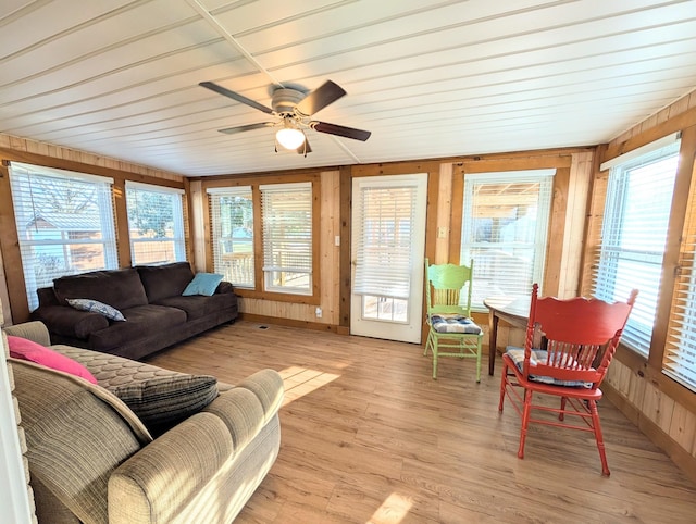 sunroom with a ceiling fan