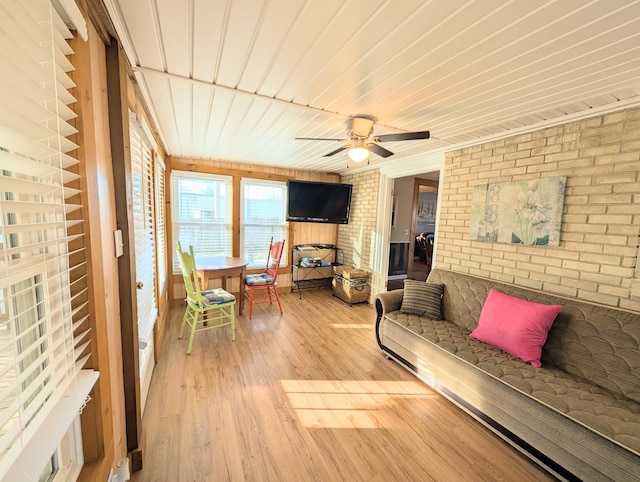 sunroom / solarium with ceiling fan