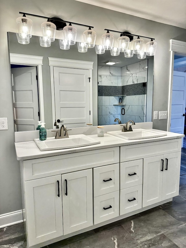 full bathroom with a stall shower, a sink, and double vanity