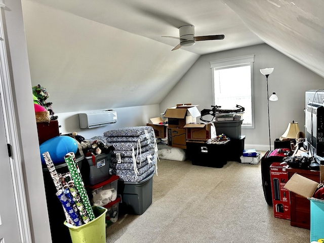 additional living space with lofted ceiling, ceiling fan, a wall unit AC, and carpet flooring