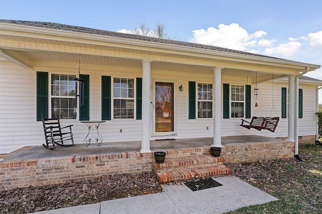 property entrance with a porch