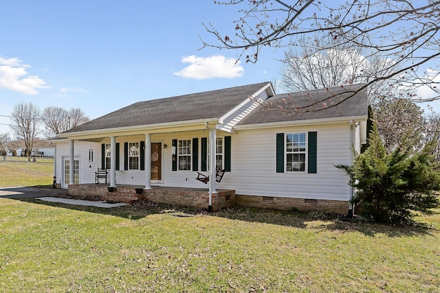 view of front of house featuring a porch, a front yard, crawl space, and a shingled roof