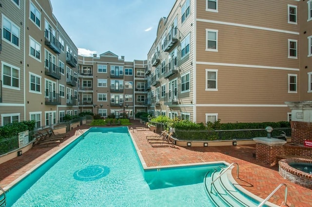 community pool featuring a patio