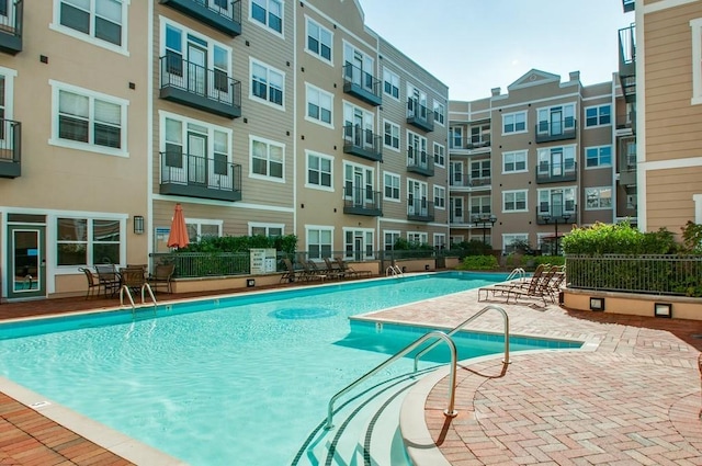 community pool featuring a patio