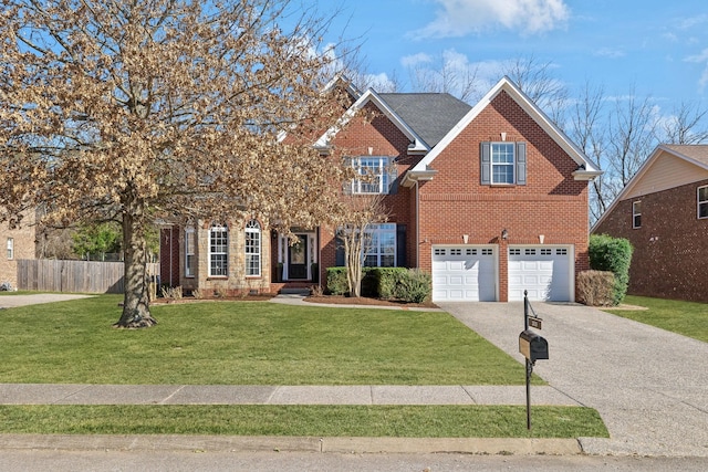 view of front of home with aphalt driveway, an attached garage, fence, a front lawn, and brick siding