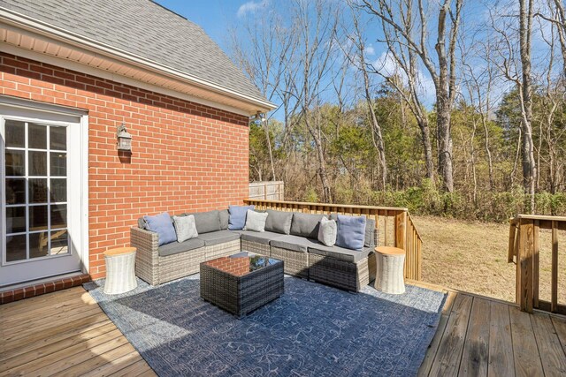 wooden deck featuring an outdoor living space