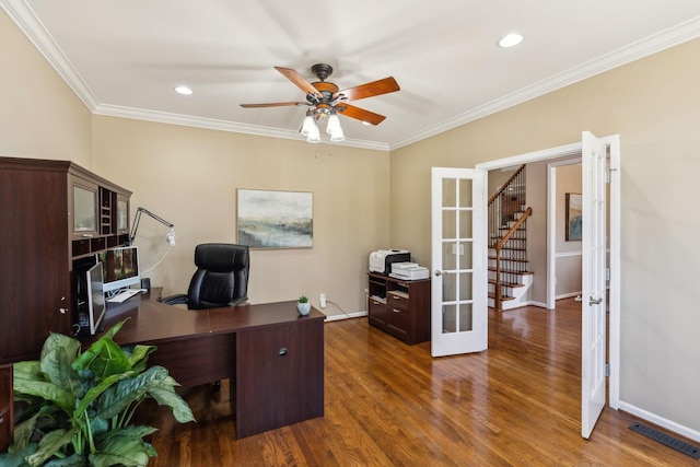 office space featuring french doors, dark wood-type flooring, visible vents, and crown molding