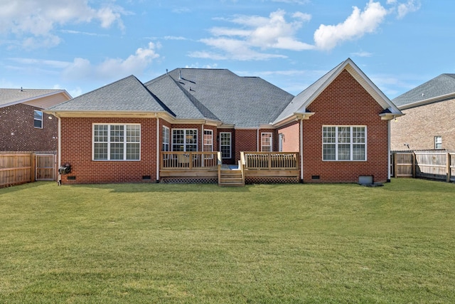 back of property with brick siding, crawl space, a wooden deck, and a fenced backyard