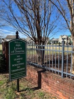 view of community with fence