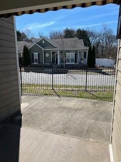 view of gate featuring fence