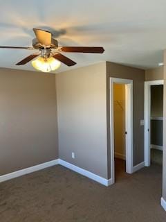 unfurnished room featuring carpet floors, ceiling fan, and baseboards