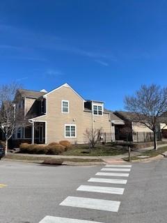 view of road with curbs and sidewalks