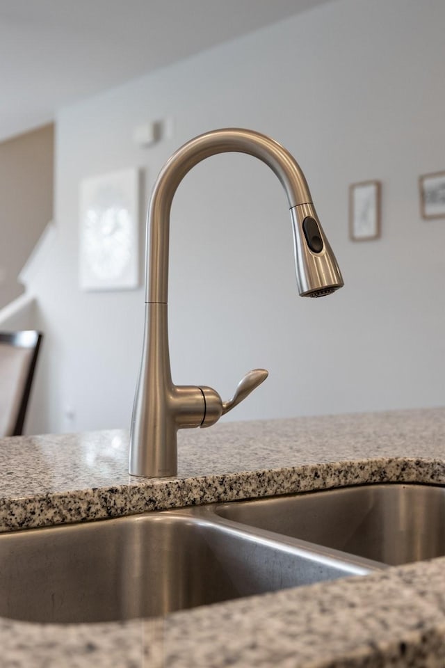 interior details featuring a sink