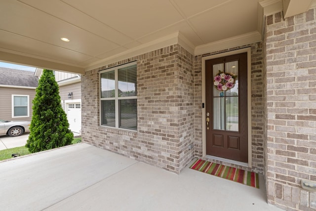 property entrance with brick siding