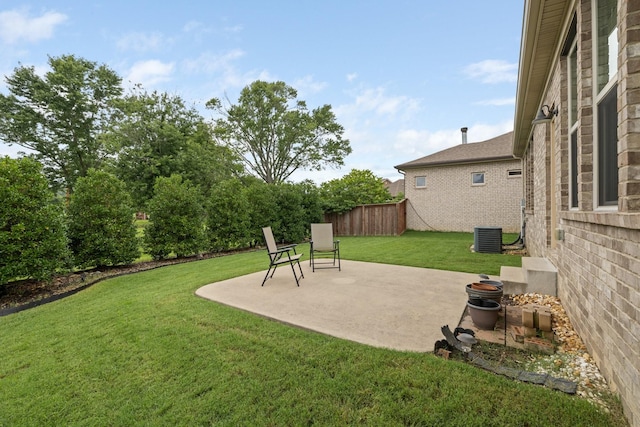 view of yard with a patio and fence