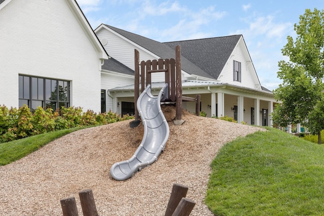 view of play area featuring a yard