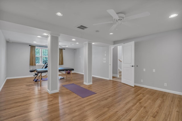 exercise room with recessed lighting, a ceiling fan, visible vents, baseboards, and light wood finished floors