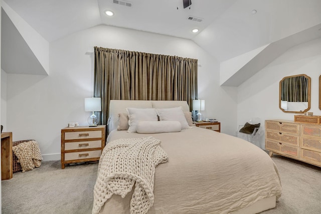 bedroom featuring carpet floors, visible vents, and lofted ceiling