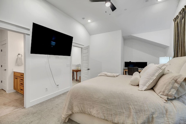 bedroom featuring lofted ceiling, recessed lighting, light carpet, a ceiling fan, and ensuite bath