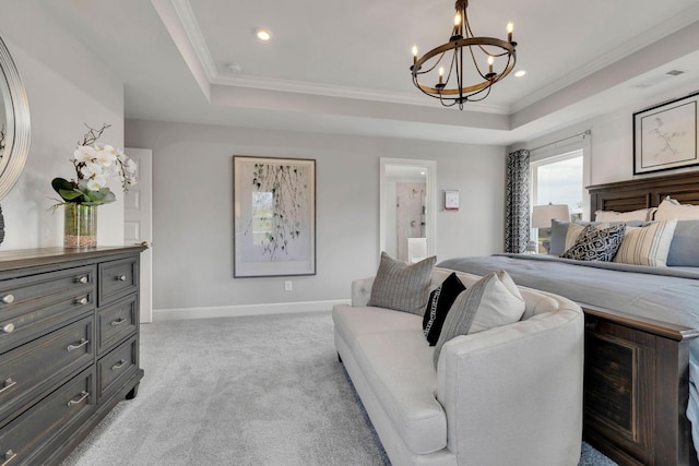 bedroom featuring ornamental molding, a tray ceiling, light carpet, and baseboards