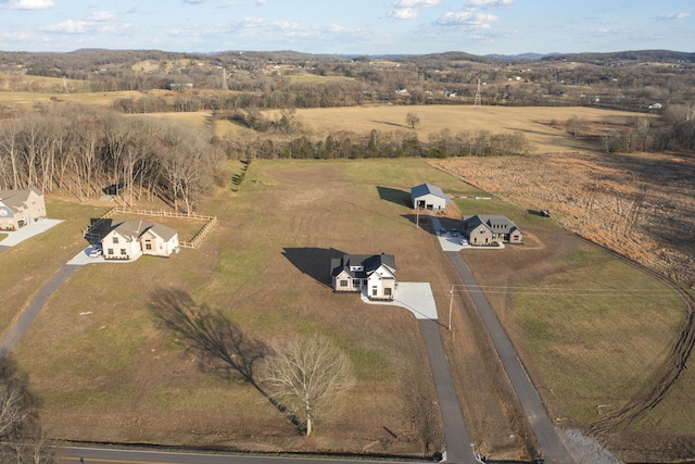 birds eye view of property featuring a rural view