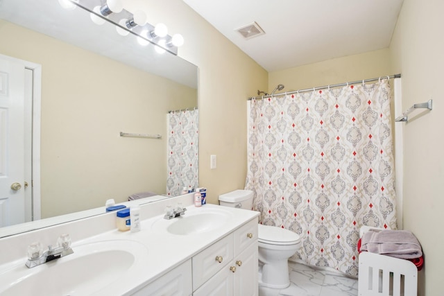 bathroom featuring toilet, marble finish floor, visible vents, and a sink