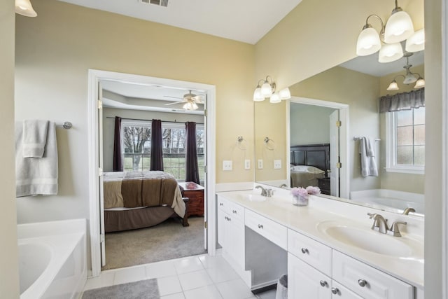 full bath featuring a sink, ensuite bath, and a bath