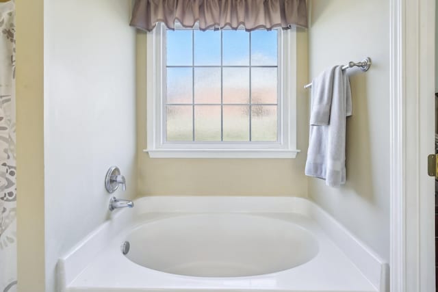 full bathroom with a garden tub