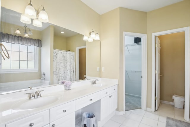 bathroom with double vanity, tile patterned flooring, a sink, and an inviting chandelier