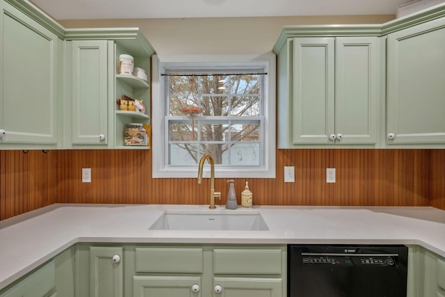 kitchen featuring black dishwasher and green cabinets